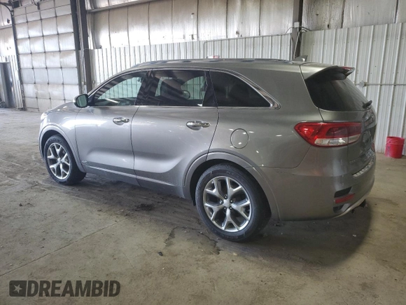 2016 Kia Sorento SXL z VIN 5XYPKDA10GG010538, wystawiony jako Copart lot #52142825 z przebiegiem 82 466 mil mil oraz Czysty tytuł • Clean title. Historia ofert i sprzedaży dostępna na DreamBid. Obrazek 2.