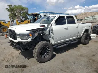 2021 Ram 2500 Laramie z VIN 3C6UR5FL2MG591673, wystawiony jako Copart lot #55653845 z przebiegiem 128 929 mil mil oraz Szkoda całkowita • Salvage title. Historia ofert i sprzedaży dostępna na DreamBid. Obrazek 1.