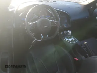 2011 Audi R8 z VIN WUAVNAFG5BN000537, wystawiony jako Copart lot #79313334 z przebiegiem Nie podano mil oraz Szkody całkowita. Historia ofert i sprzedaży dostępna na DreamBid. Obrazek 8.