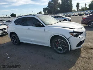 2023 Alfa Romeo Stelvio Ti with VIN ZASPAKBN2P7D64686, listed as a Copart auction lot 84976964 with 0 mi miles and Salvage Title. Bid and sale history available at carsss.com. Image 4.