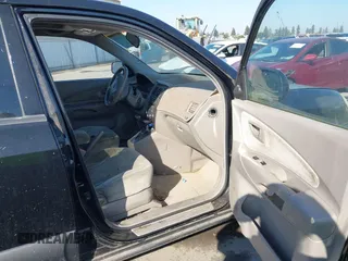 2005 Hyundai Tucson GLS with VIN KM8JN12D55U142254, listed as a IAAI auction lot 42150708 with 222,286 mi miles. Bid and sale history available at carsss.com. Image 5.