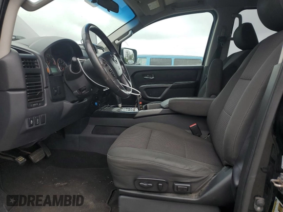 2015 Nissan Titan SV with VIN 1N6AA0EC2FN503980, listed as a Copart auction lot 64664665 with 124,589 mi miles and Clean title. Bid and sale history available at DreamBid. Image 7.