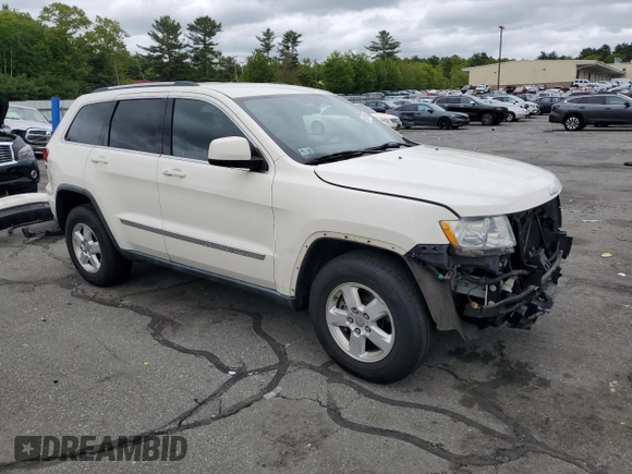 2011 Jeep Grand Cherokee Laredo with VIN 1J4RR4GG9BC515467, listed as a Copart auction lot 58411085 with 112,558 mi miles and Salvage title. Bid and sale history available at DreamBid. Image 4.