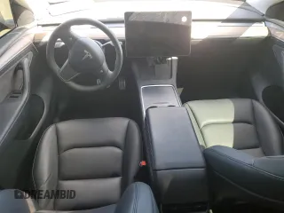 2023 Tesla Model Y Performance with VIN 7SAYGDEF3PF946496, listed as a Copart auction lot 50800315 with 15,077 mi miles and Salvage Title. Bid and sale history available at DreamBid. Image 8.