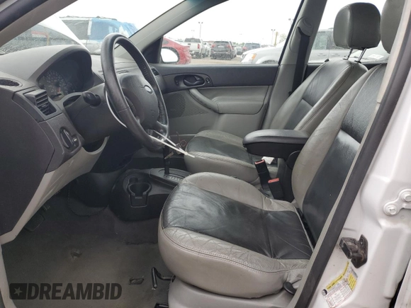 2007 Ford Focus S z VIN 1FAHP34N57W223198, wystawiony jako Copart lot #55725345 z przebiegiem 174 833 mil mil oraz Szkoda całkowita • Salvage title. Historia ofert i sprzedaży dostępna na DreamBid. Obrazek 7.