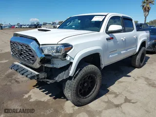 2019 Toyota Tacoma 4WD SR with VIN 3TMCZ5AN3KM207007, listed as a IAAI auction lot 41755529 with 43,203 mi miles. Bid and sale history available at carsss.com. Image 2.