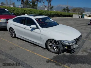 2017 BMW 4 Series 430i with VIN WBA4F7C31HG789340, listed as a IAAI auction lot 41871217 with 97,971 mi miles. Bid and sale history available at carsss.com. Image 1.