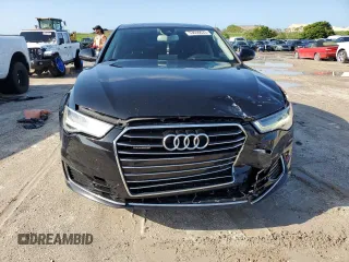 2016 Audi A6 Prestige with VIN WAUHGAFC9GN000885, listed as a Copart auction lot 53656633 with 98,685 mi miles and Salvage title. Bid and sale history available at DreamBid. Image 5.