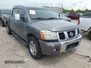 2004 Nissan Titan SE with VIN 1N6AA07AX4N590102, listed as a IAAI auction lot 42575732 with 307,316 mi miles and . Bid and sale history available at DreamBid. Image 1.