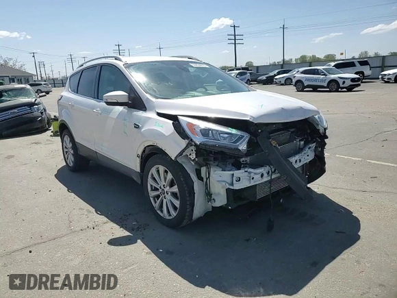 2017 Ford Escape Titanium with VIN 1FMCU9J90HUD28716, listed as a Copart auction lot 53694635 with 90,484 mi miles and Salvage Title. Bid and sale history available at carsss.com. Image 12.