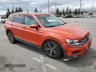 2018 Volkswagen Tiguan SEL with VIN 3VV3B7AX8JM083219, listed as a Copart auction lot 54275945 with 59,780 mi miles and Salvage title. Bid and sale history available at DreamBid. Image 4.