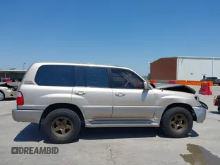 2000 Lexus LX 470 z VIN JT6HT00W4Y0114729, wystawiony jako IAAI lot #42227081 z przebiegiem 129 117 mil mil oraz . Historia ofert i sprzedaży dostępna na DreamBid. Obrazek 14.