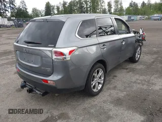 2014 Mitsubishi Outlander GT with VIN JA4JZ4AX9EZ017406, listed as a IAAI auction lot 42291696 with 107,680 mi miles and . Bid and sale history available at DreamBid. Image 4.