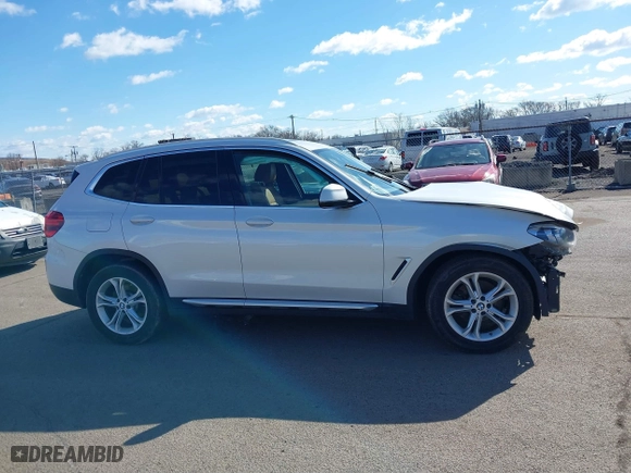 2019 BMW X3 xDrive30i with VIN 5UXTR9C53KLE14519, listed as a IAAI auction lot 41747651 with 141,273 mi miles. Bid and sale history available at carsss.com. Image 13.