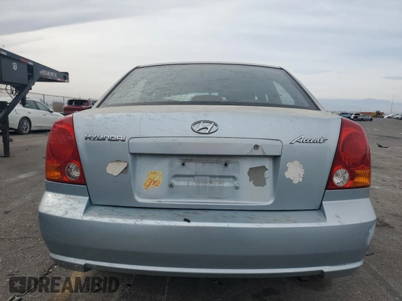 2004 Hyundai Accent GL with VIN KMHCG45C34U567915, listed as a Copart auction lot 43654985 with 141,461 mi miles and Clean Title. Bid and sale history available at carsss.com. Image 6.