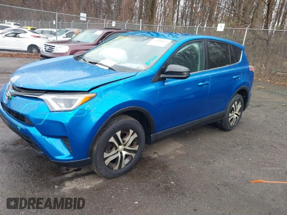 2016 Toyota RAV4 LE with VIN JTMBFREV9GJ100635, listed as a IAAI auction lot 41858669 with 171,644 mi miles. Bid and sale history available at carsss.com. Image 17.