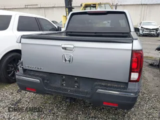 2018 Honda Ridgeline Sport with VIN 5FPYK2F19JB000713, listed as a IAAI auction lot 41300244 with 52,119 mi miles and . Bid and sale history available at DreamBid. Image 16.