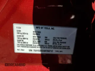 2025 Tesla Model Y Long Range z VIN 7SAYGDEE4SF260712, wystawiony jako Copart lot #54208975 z przebiegiem 1054 mil mil oraz Szkoda całkowita • Salvage title. Historia ofert i sprzedaży dostępna na DreamBid. Obrazek 13.