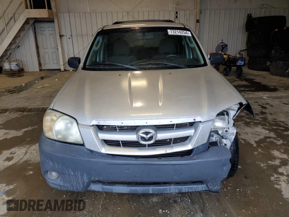 2006 Mazda Tribute i with VIN 4F2YZ02Z86KM02172, listed as a Copart auction lot 73214254 with 317,446 mi miles and Salvage Title. Bid and sale history available at DreamBid. Image 5.
