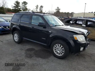 2008 Mercury Mariner Premier z VIN 4M2CU97168KJ31769, wystawiony jako Copart lot #50248325 z przebiegiem 133 450 mil mil oraz Szkody całkowita. Historia ofert i sprzedaży dostępna na DreamBid. Obrazek 4.