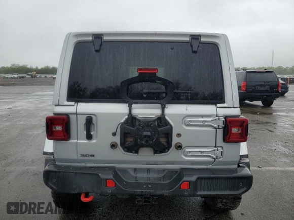 2023 Jeep Wrangler Rubicon with VIN 1C4JJXFM4PW589923, listed as a Copart auction lot 58725465 with 9,814 mi miles and Salvage title. Bid and sale history available at DreamBid. Image 6.