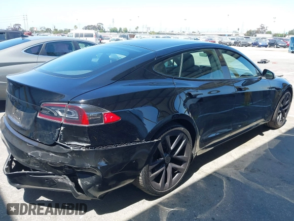 2021 Tesla Model S Long Range z VIN 5YJSA1E54MF429360, wystawiony jako IAAI lot #42662440 z przebiegiem 36 395 mil mil oraz . Historia ofert i sprzedaży dostępna na DreamBid. Obrazek 4.