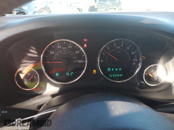 2014 Jeep Wrangler Unlimited Sport with VIN 1C4BJWDG2EL319714, listed as a Copart auction lot 47924575 with 129,294 mi miles and Salvage Title. Bid and sale history available at DreamBid. Image 9.