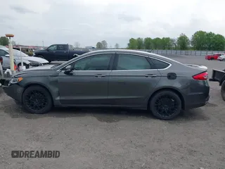 2018 Ford Fusion Titanium z VIN 3FA6P0K9XJR160993, wystawiony jako IAAI lot #41938148 z przebiegiem 137 410 mil mil oraz . Historia ofert i sprzedaży dostępna na DreamBid. Obrazek 14.