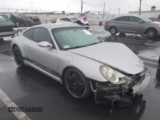 2006 Porsche 911 z VIN WP0AA29986S716141, wystawiony jako IAAI lot #41198397 z przebiegiem 162 423 mil mil oraz . Historia ofert i sprzedaży dostępna na DreamBid. Obrazek 1.