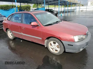 2002 Hyundai Elantra GT with VIN KMHDN55D52U068507, listed as a Copart auction lot 50656835 with 201,909 mi miles and Salvage title. Bid and sale history available at DreamBid. Image 4.