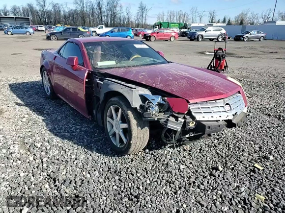 2004 Cadillac XLR z VIN 1G6YV34A945603839, wystawiony jako Copart lot #47592565 z przebiegiem Nie podano mil oraz Szkody całkowita. Historia ofert i sprzedaży dostępna na DreamBid. Obrazek 11.