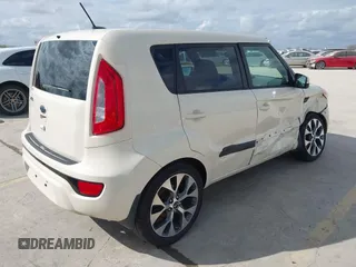 2012 Kia Soul + with VIN KNDJT2A63C7462882, listed as a IAAI auction lot 41162839 with 102,904 mi miles. Bid and sale history available at carsss.com. Image 4.