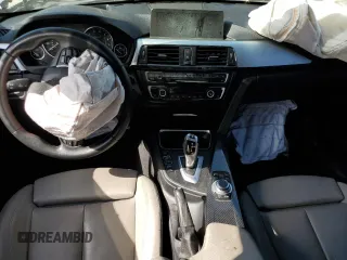 2012 BMW 3 Series 335i with VIN WBA3A9C5XCF474803, listed as a Copart auction lot 57940675 with 121,960 mi miles and Salvage title. Bid and sale history available at DreamBid. Image 8.