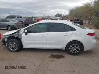 2021 Toyota Corolla Hybrid LE with VIN JTDEAMDE6MJ008815, listed as a IAAI auction lot 41586643 with 7,548 mi miles. Bid and sale history available at carsss.com. Image 14.