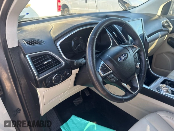 2021 Ford Edge Titanium with VIN 2FMPK3K96MBA51234, listed as a IAAI auction lot 42886659 with 74,183 mi miles and . Bid and sale history available at DreamBid. Image 8.