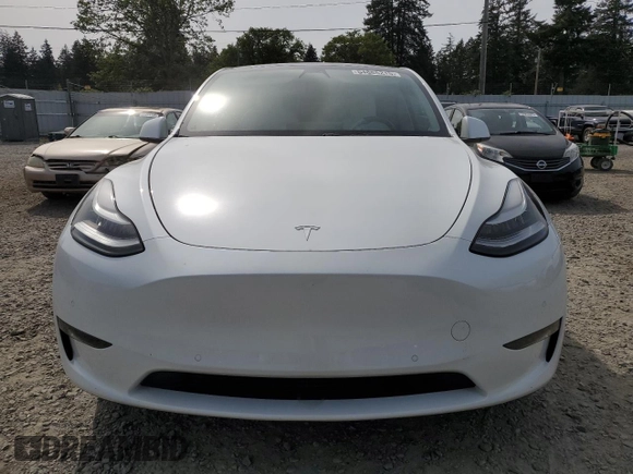 2020 Tesla Model Y Long Range with VIN 5YJYGDEF2LF006357, listed as a Copart auction lot 54888215 with 55,983 mi miles and Salvage Title. Bid and sale history available at DreamBid. Image 5.