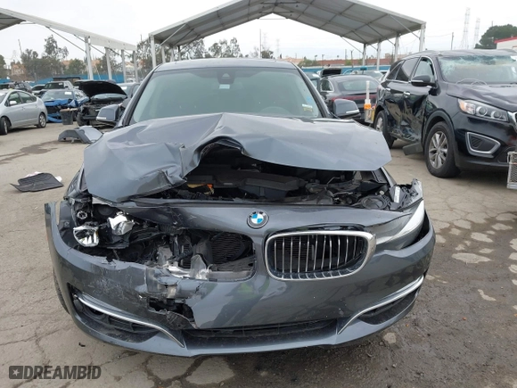 2015 BMW 3 Series Gran Turismo 328i xDrive with VIN WBA3X5C50FD559804, listed as a IAAI auction lot 41902204 with 88,891 mi miles. Bid and sale history available at carsss.com. Image 12.