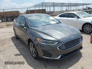 2020 Ford Fusion SEL z VIN 3FA6P0CD4LR204444, wystawiony jako IAAI lot #42236299 z przebiegiem 115 630 mil mil oraz . Historia ofert i sprzedaży dostępna na DreamBid. Obrazek 1.
