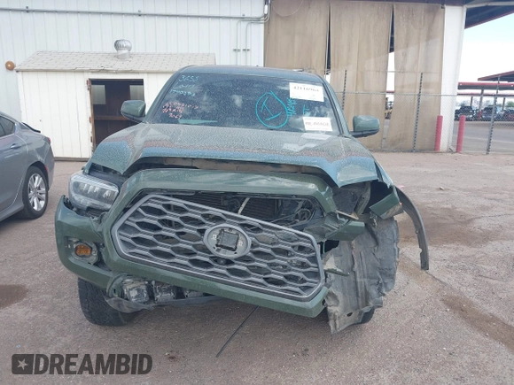 2021 Toyota Tacoma SR z VIN 3TYCZ5AN2MT049069, wystawiony jako IAAI lot #42116964 z przebiegiem 96 275 mil mil oraz . Historia ofert i sprzedaży dostępna na DreamBid. Obrazek 12.