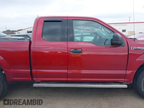 2017 Ford F-150 XL with VIN 1FTEX1E84HKD63147, listed as a IAAI auction lot 41148445 with 106,670 mi miles. Bid and sale history available at carsss.com. Image 14.