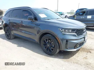 2023 Kia Sorento SX z VIN 5XYRK4LF0PG171635, wystawiony jako IAAI lot #42116649 z przebiegiem 75 348 mil mil oraz . Historia ofert i sprzedaży dostępna na DreamBid. Obrazek 1.