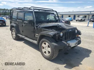 2012 Jeep Wrangler Unlimited Sahara with VIN 1C4HJWEG5CL205826, listed as a Copart auction lot 58222115 with 98,940 mi miles and Salvage title. Bid and sale history available at DreamBid. Image 4.