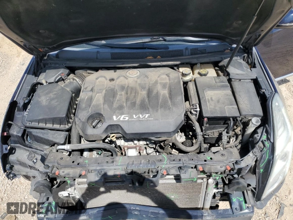 2015 Cadillac XTS Luxury z VIN 2G61M5S32F9169354, wystawiony jako Copart lot #54887215 z przebiegiem 138 795 mil mil oraz Szkoda całkowita • Salvage title. Historia ofert i sprzedaży dostępna na DreamBid. Obrazek 11.
