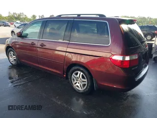 2007 Honda Odyssey EX-L z VIN 5FNRL387X7B416523, wystawiony jako IAAI lot #42245359 z przebiegiem 224 645 mil mil oraz . Historia ofert i sprzedaży dostępna na DreamBid. Obrazek 3.