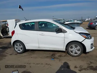 2022 Chevrolet Spark LS with VIN KL8CB6SA3NC036523, listed as a IAAI auction lot 41421387 with 59,801 mi miles and . Bid and sale history available at DreamBid. Image 13.