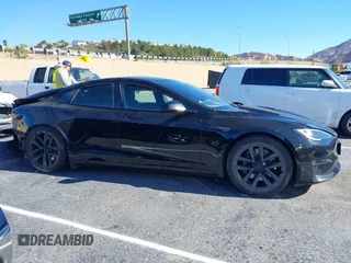 2022 Tesla Model S with VIN 5YJSA1E52NF476906, listed as a IAAI auction lot 41320074 with Not Provided miles and . Bid and sale history available at DreamBid. Image 12.