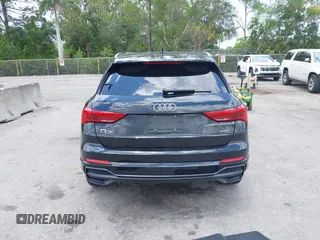 2020 Audi Q3 S line Premium Plus with VIN WA1EECF33L1052774, listed as a IAAI auction lot 42199200 with 55,008 mi miles and . Bid and sale history available at DreamBid. Image 16.
