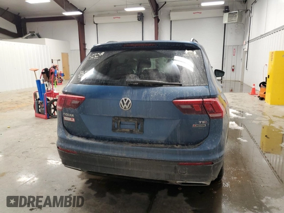 2018 Volkswagen Tiguan S z VIN 3VV0B7AX9JM034033, wystawiony jako Copart lot #43441295 z przebiegiem 127 719 mil mil oraz Szkoda całkowita • Salvage title. Historia ofert i sprzedaży dostępna na DreamBid. Obrazek 6.