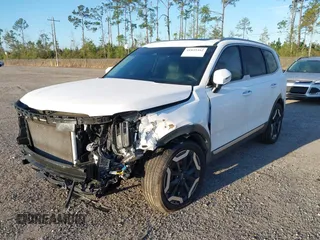 2023 Kia Telluride S with VIN 5XYP64GC8PG327724, listed as a IAAI auction lot 41839462 with 26,891 mi miles and . Bid and sale history available at carsss.com. Image 2.