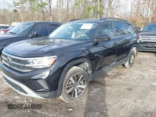 2021 Volkswagen Atlas SE with VIN 1V2DP2CA5MC545191, listed as a IAAI auction lot 41464429 with 90,350 mi miles and . Bid and sale history available at DreamBid. Image 2.